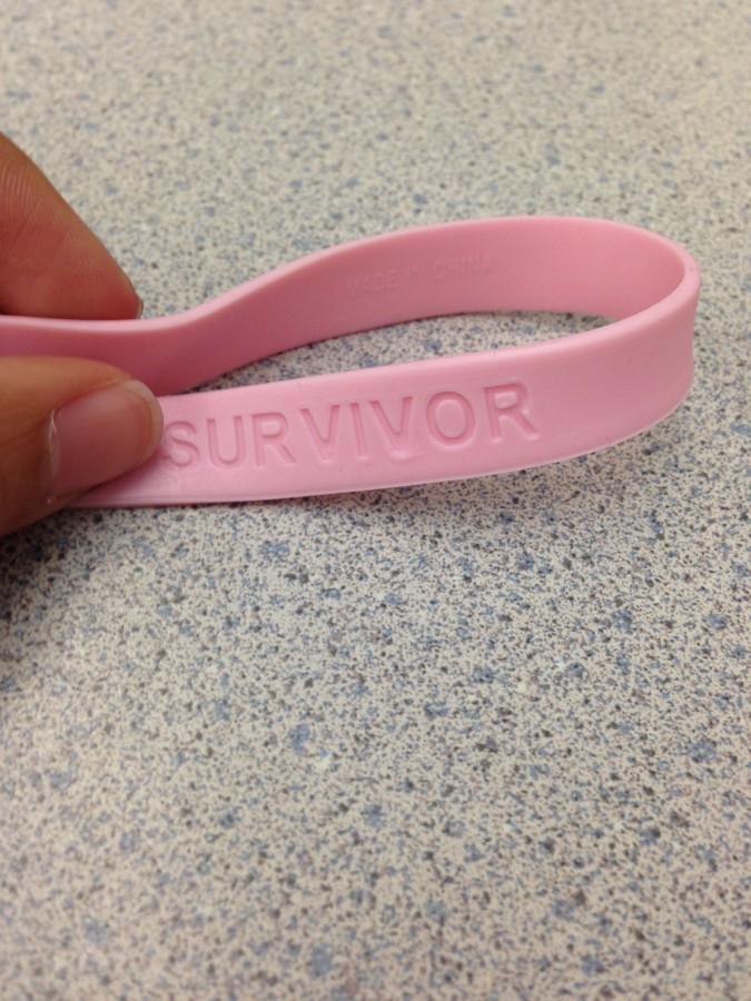 Bracelets that the Robinson Volleyball team has been selling for supporting breast cancer research.