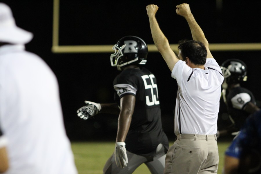 Defensive coach Vaughn Volpi celebrates as the Knights come up with a defensive stop.