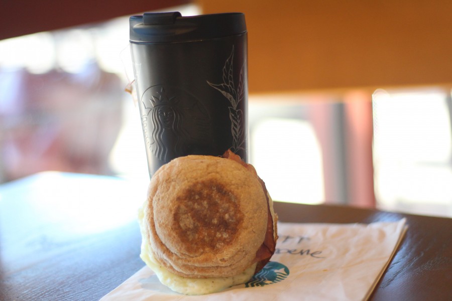 A turkey bacon breakfast sandwich and hot tea are good breakfast choices at Starbucks.