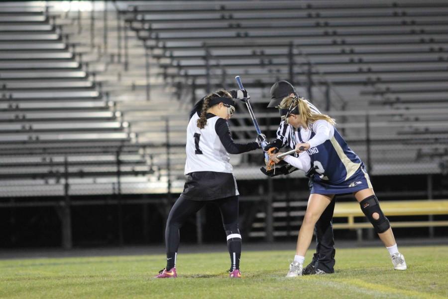 Captain Alexa Keeler (17) in a face-off during Friday nights win against Alonso.