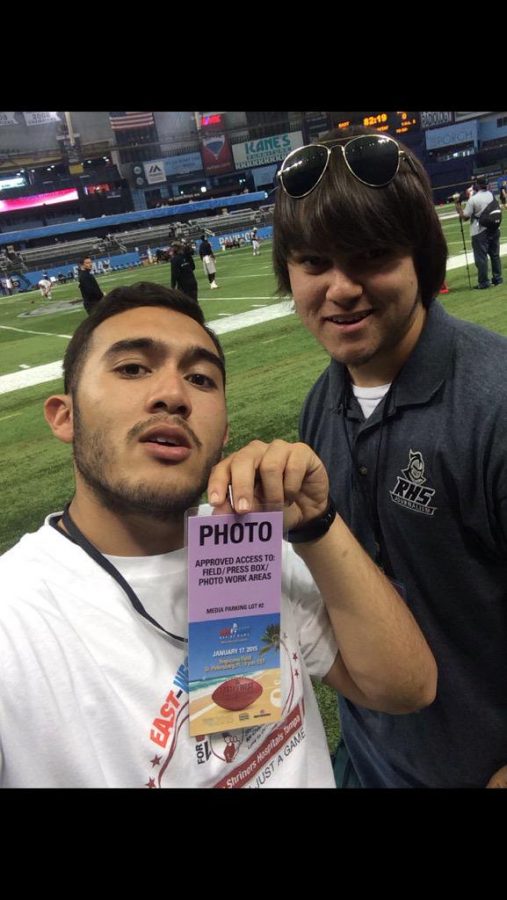 2014-2015 Excalibur editor-in-chief Matthew Hall poses with sports editor Bailey Adams at the 2015 Shrine Game, which the two covered for RHStoday,com.