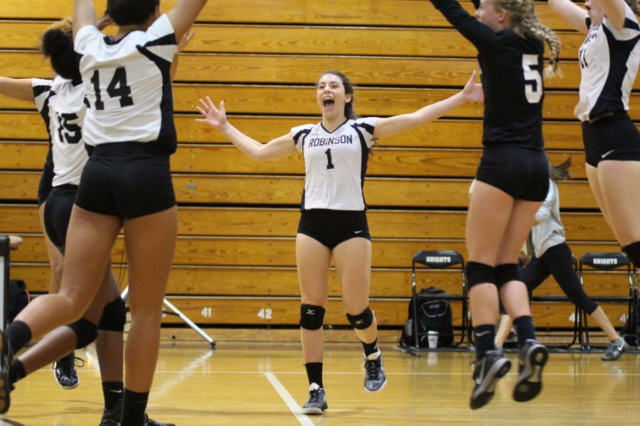 Setter+Ashley+Osiason+%2818%29+celebrates+after+the+Knights+scored+the+winning+point+to+end+the+third+set+and+the+game.