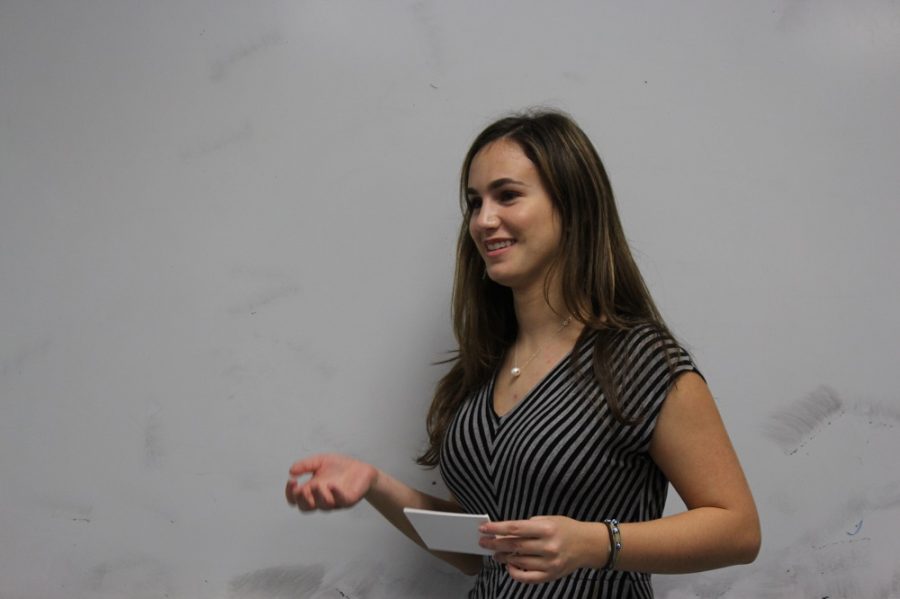 Ally Weisman (18) presents her topic on Nathaniel Hawthornes The Scarlet Letter.