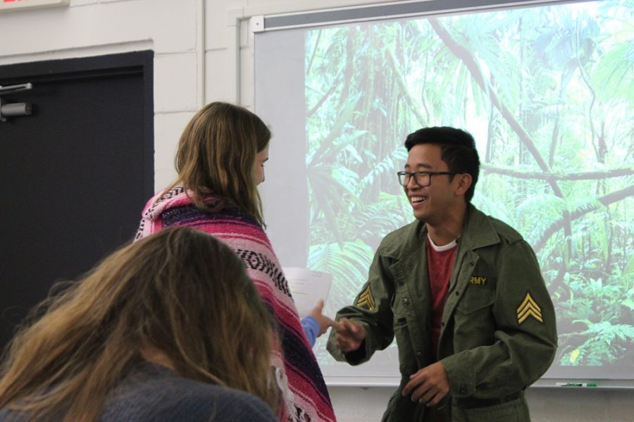 Sean Tran (17, right) and Alexis Petterson (17, left) perform a skit about the Guatemalan Revolution.