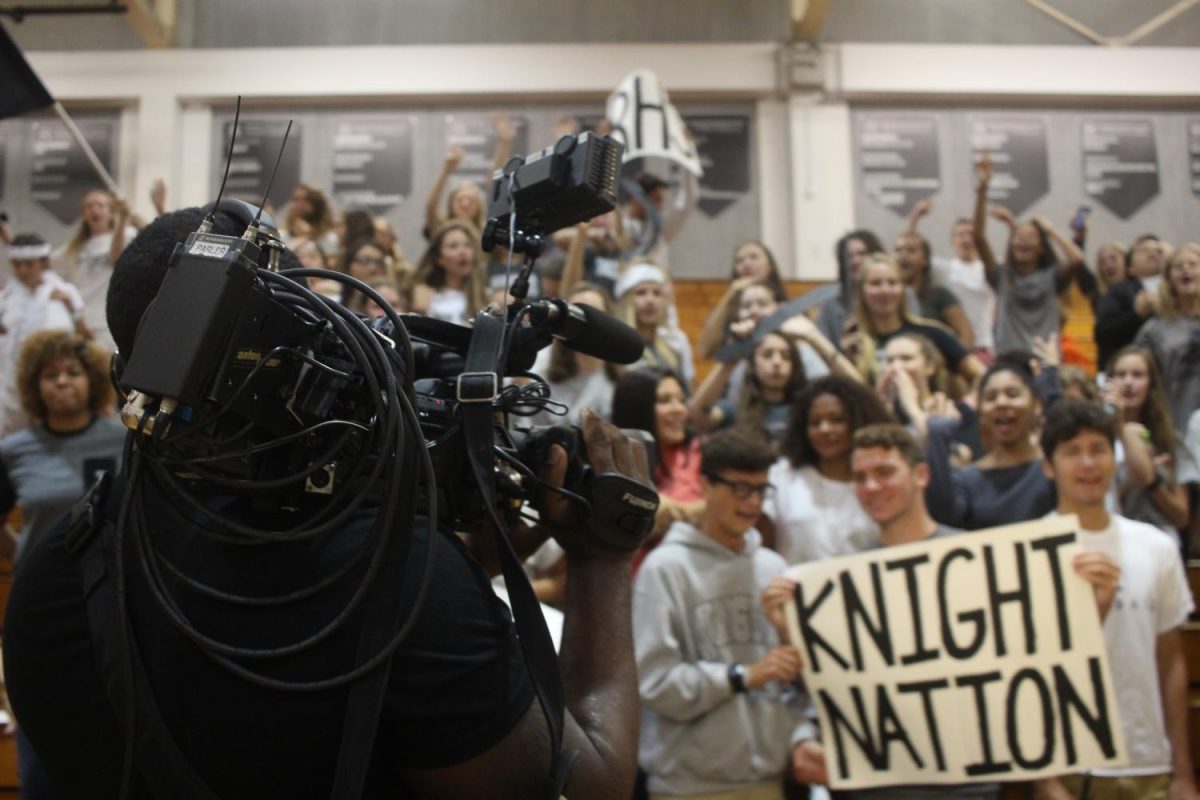 Students+cheer+and+show+their+spirit+while+being+filmed+at+last+years+morning+pep+rally.