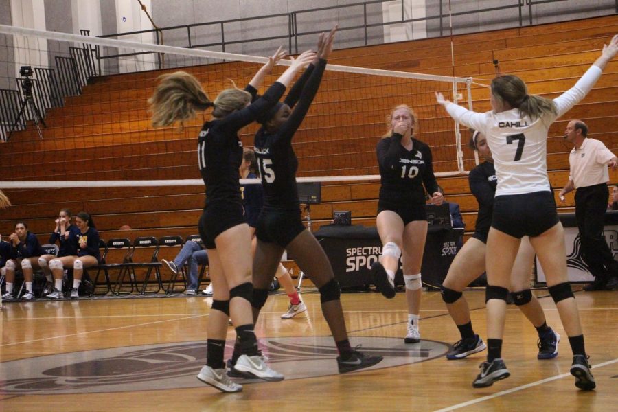 Lady Knights celebrate as the score a point against Steinbrenner on Monday night.