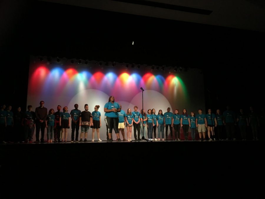 The cast of this years Broadway Knights stands center stage during their performance.