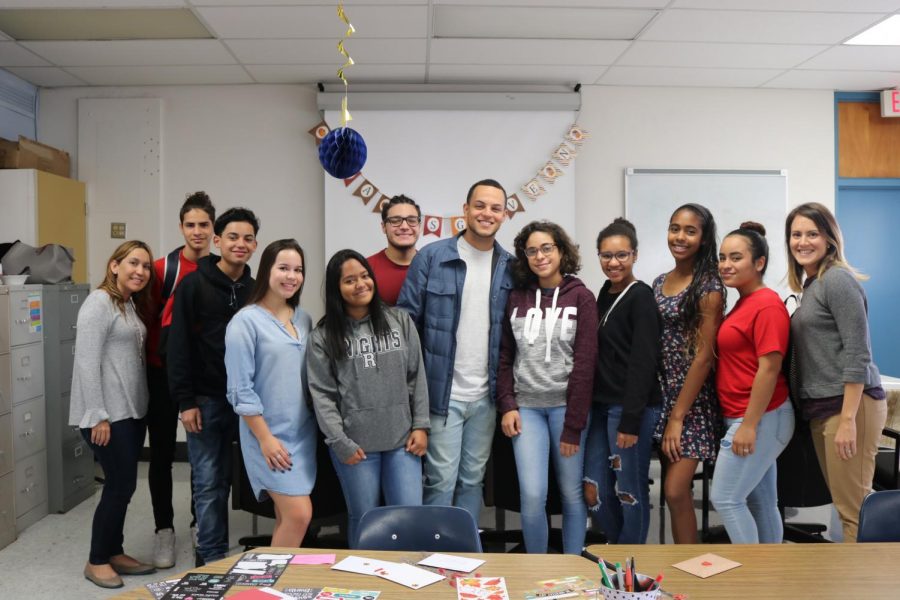 Robinson provides a support group for students affected by the natural disasters in Puerto Rico. Members gather around with advisors for a photo at their meeting on Nov. 17.