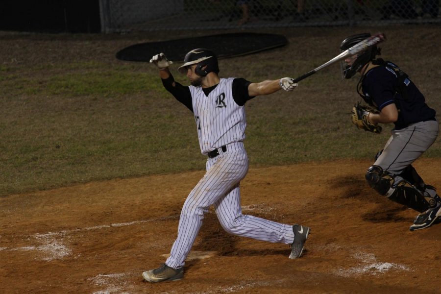 Chase Volpi (18) hits a double against Newsome on Thursday, Feb. 22.