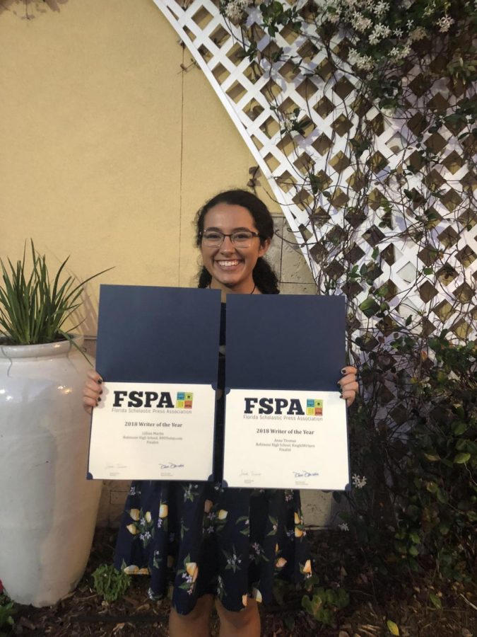 News Editor Lillian Martin (18) poses with award certificates at the FSPA banquet in Orland. There, Martin was recognized as a finalist for the 2018 Writer of the Year award.