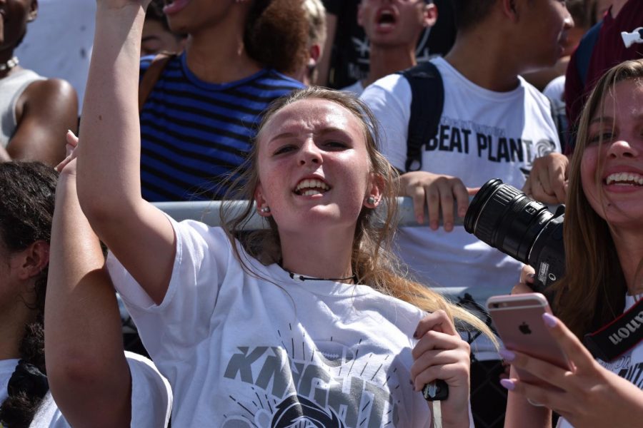 Madison Courtemanche (18) cheers during the 2017 Plant pep rally.