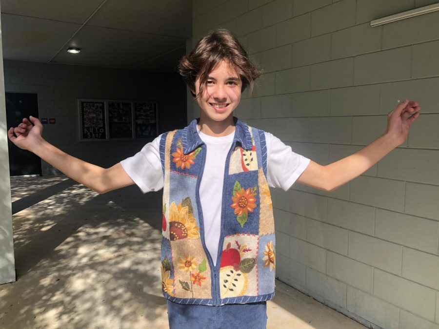 Marvin Roush (21) shows off his thrifted outfit.