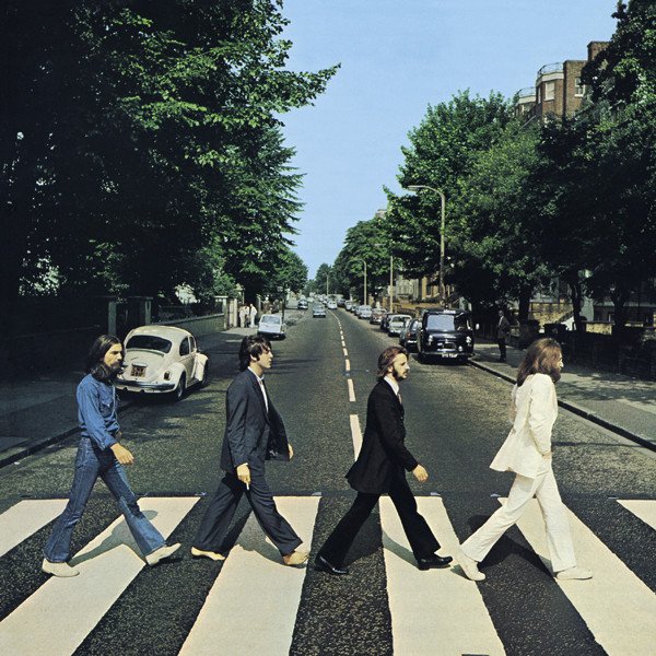The signature Abbey Road album cover, featuring George Harrison, Paul McCartney, Ringo Starr, and John Lennon.