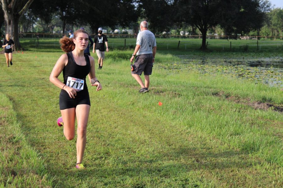 Shea Dingle (21) runs in a race at the Mary Help meet on August 29.