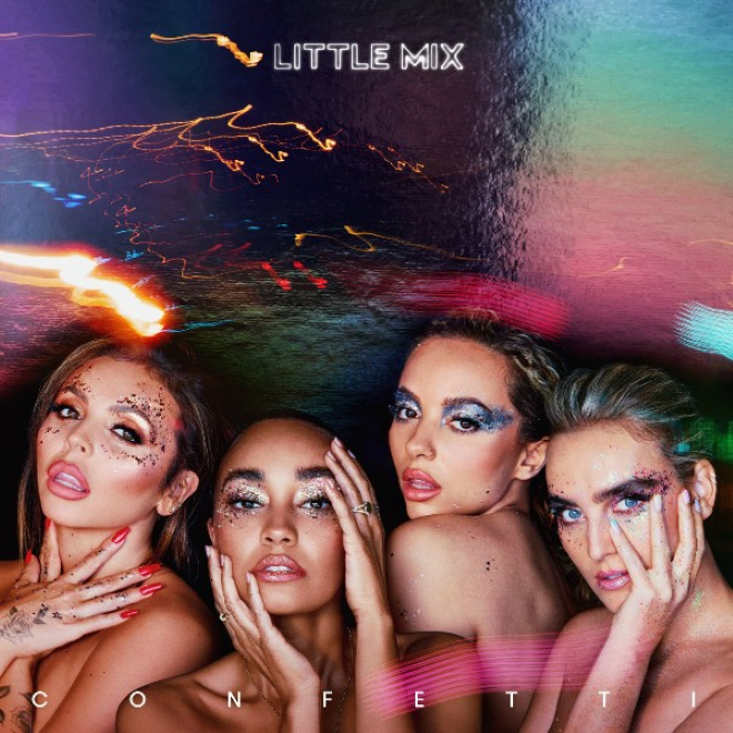 The album art for Confetti by Little Mix, showing the four members covered in the titular confetti. 