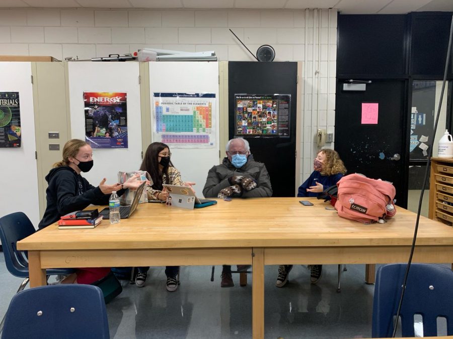Sanders takes a study break alongside Kelsi White (23) ( far left), Celeste Lara (23) and Julia Cardillo (23) during their study hall.