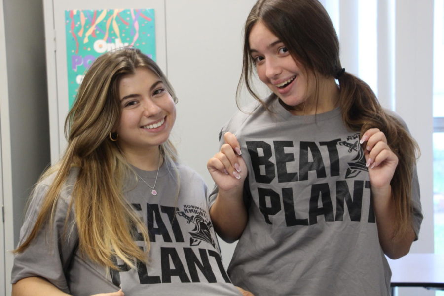 Juniors Callie Tipton and Hailey Green show off their Beat Plant t-shirts the morning of the big rival game. 