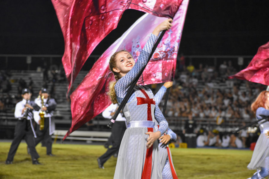 Sarina Leihy (24) grins at the stands during the Robinson Marching Bands Halftime performance at the Plant vs Robinson football game in September. 