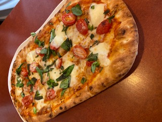 Paneras Margherita Flatbread Pizza, available for only $9.29. It is enough to feed six people and perfect for splitting with a group of friends.