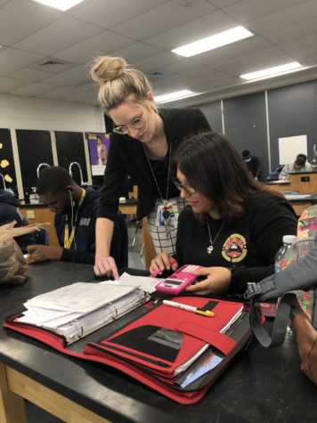 Golden helps out her student who had a question about the work.