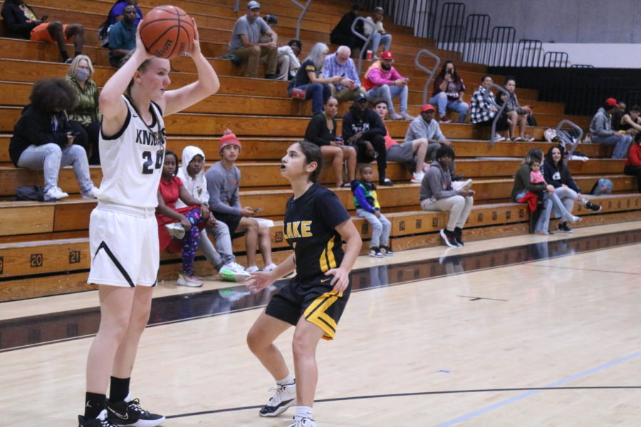 Jennifer Gutman looks to a teammate to pass the ball against Blake during the Nov. 30 game.