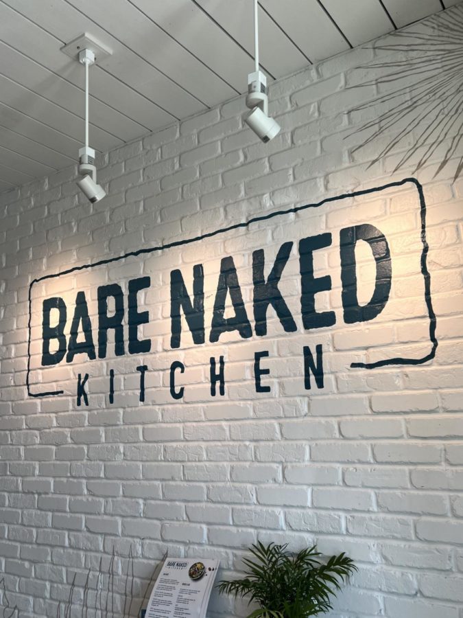 A sign of the new restaurant Bare Naked located on Henderson.