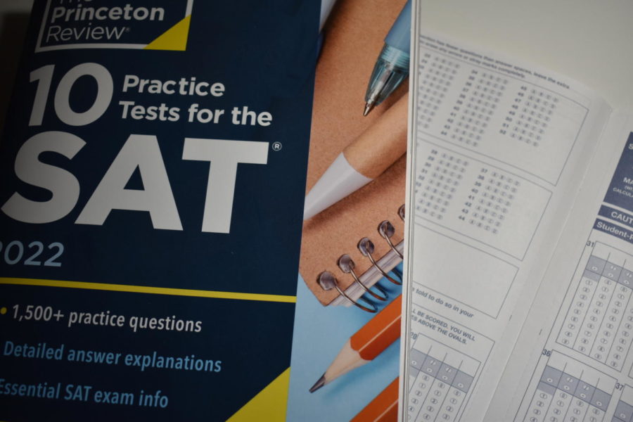 An SAT practice handbook with a scantron sheet to simulate the standard paper tests for the real assessment. 