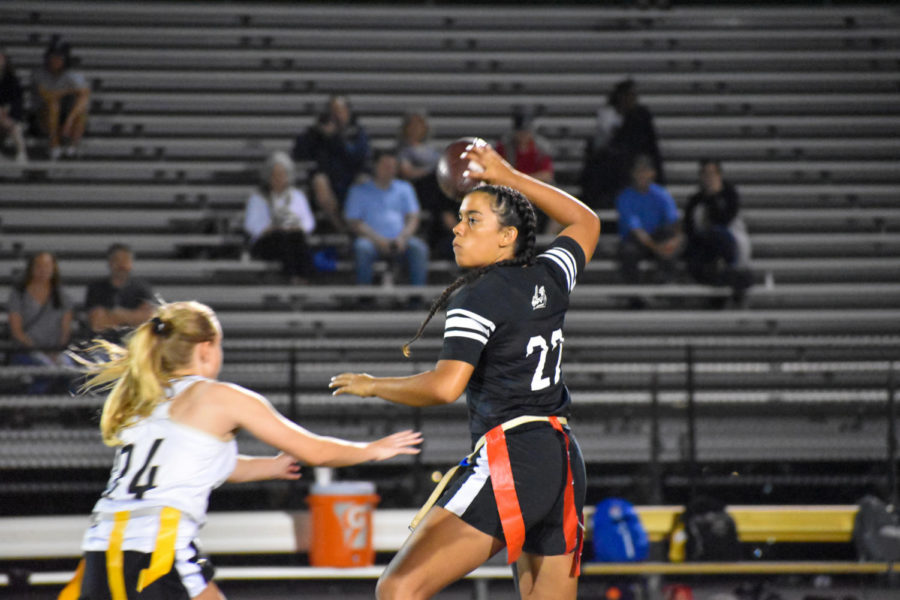 Sydney Hall (22) reels back to pass the ball to one of her teammates. 