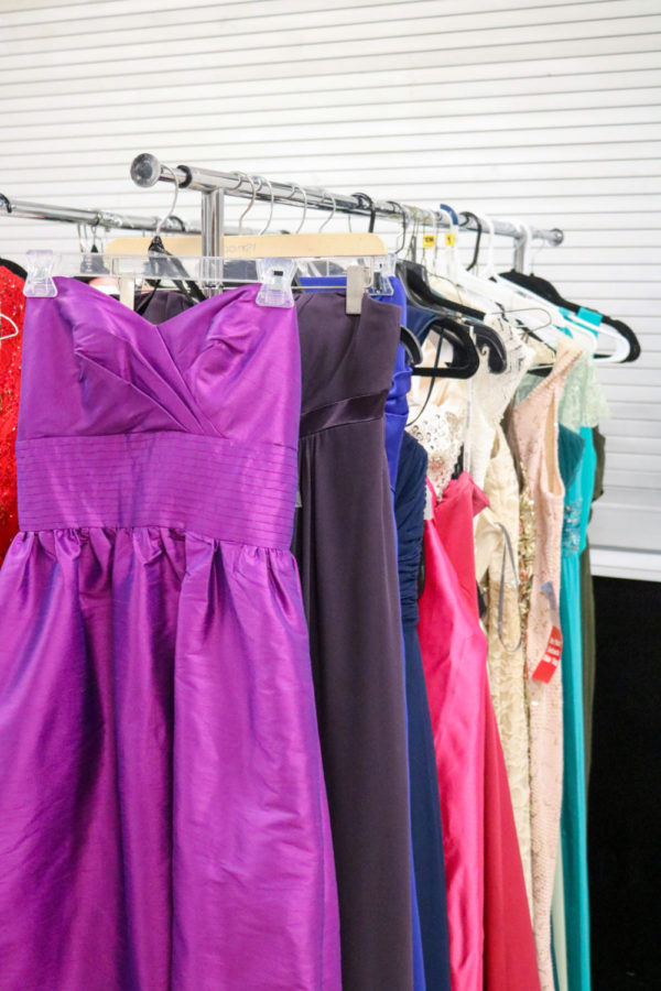 A rack of dresses in the shop.