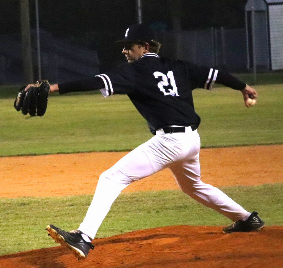 Russell Sandefer (23) about to release his pitch. The 2022 spring season had its ups and downs. Our lineup just needs to fix and improve their approach. Our coaching staff has been doing a great job of going out there and being competitive, Sandefer said.