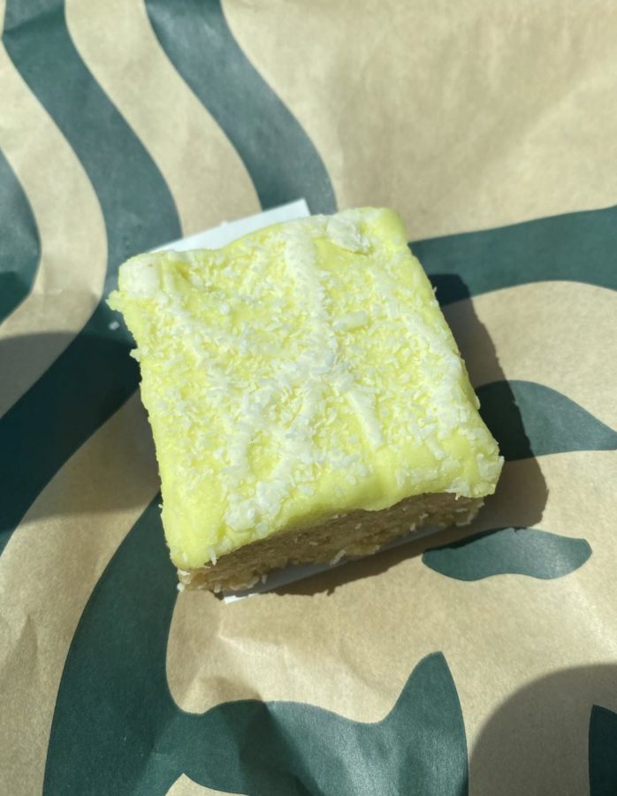 The Lime-Frosted Coconut Bar sitting on a Starbucks bag.