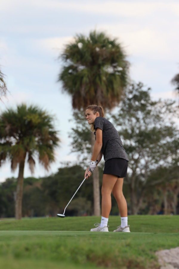 Team Captain Issa Allbritton (23) at a golf match last season.