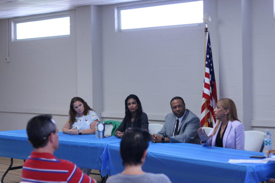 School Board candidates seen answering questions in a public forum. Pictured (left to right): Demaris Allen, Ashley Legge, Roshaun Gendrett and Karen Perez. 