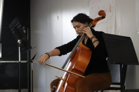 Aiya Spencer (24) plays her cello.