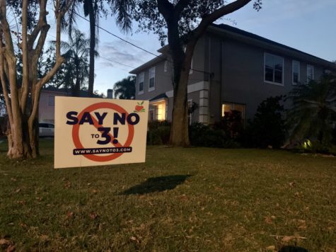 Sign against the third proposal of the upcoming Hillsborough County redistricting displayed in a front yard. 