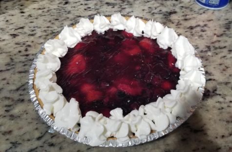 A delicious No-Bake Spring Berry Pie topped with whipped cream.