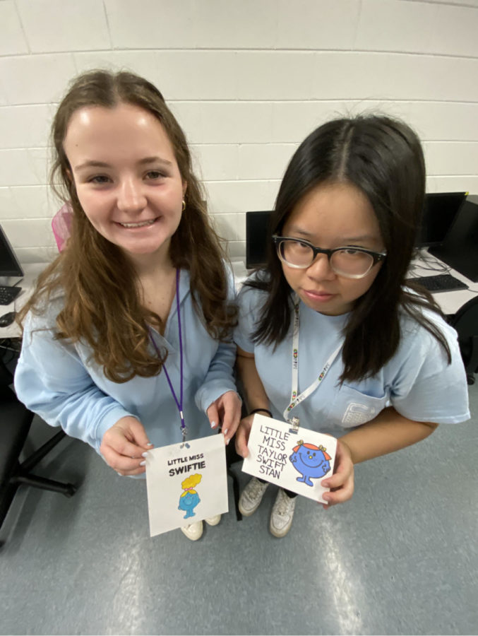 A&E Editor Cecilia Cheng (24) and Staff Writer Ashlyn Miller (25) on Little Miss day during homecoming spirit week with Taylor Swift related signs. 