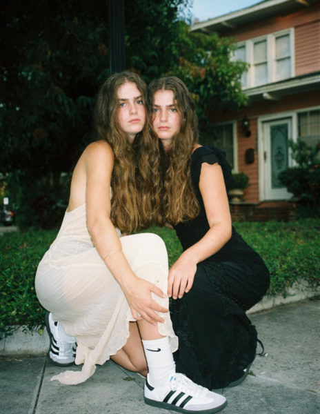 (From left to right) Ally and Alex Linsky (24) pose next to each other in one of their shoots with photographer Dani Drasin. 