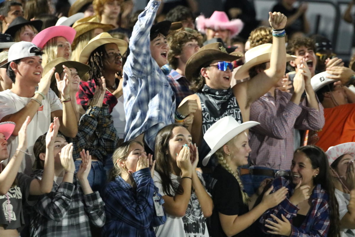 The student section as the football team scored.