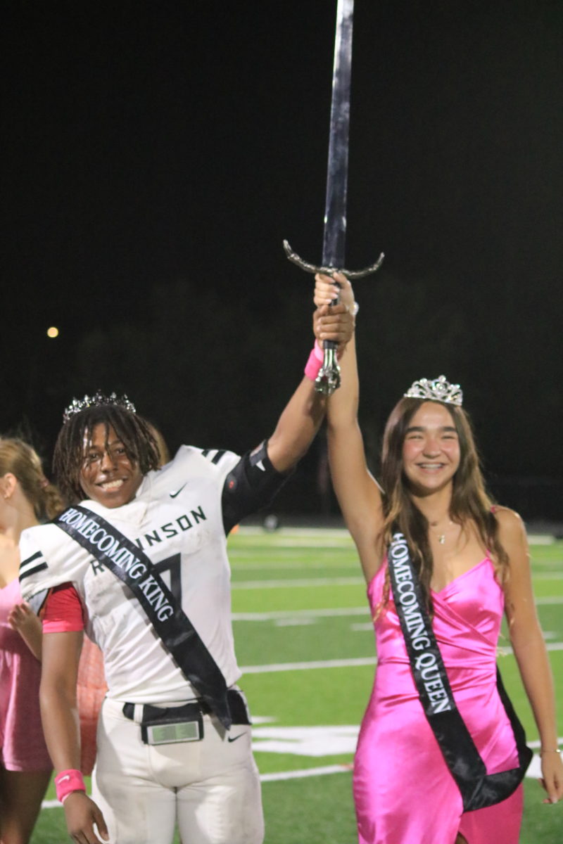 The 2023 homecoming king and queen after being crowned at halftime of the homecoming football game. 