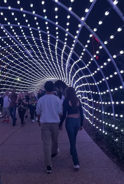 Helena Urrea (26) strolls down Christmas town at Busch Gardens with her boyfriend. 