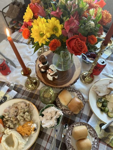 A table set and fill with food ready for Thanksgiving. 