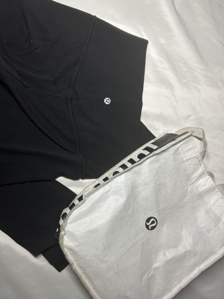 A pair of Lululemon Align leggings and one of their signature bags.
