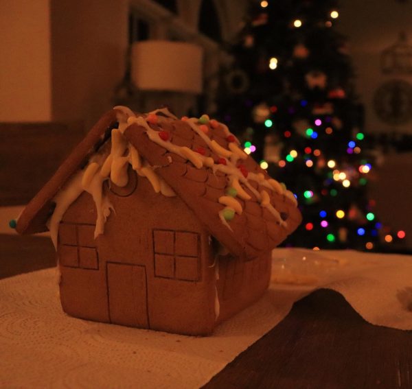 A fine gingerbread house mere moments before falling apart.