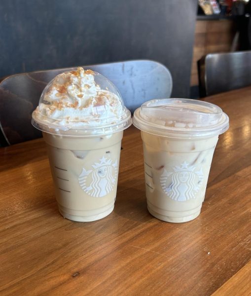 A Caramel Brulee latte and an Iced Sugar Cookie latte from Starbucks.