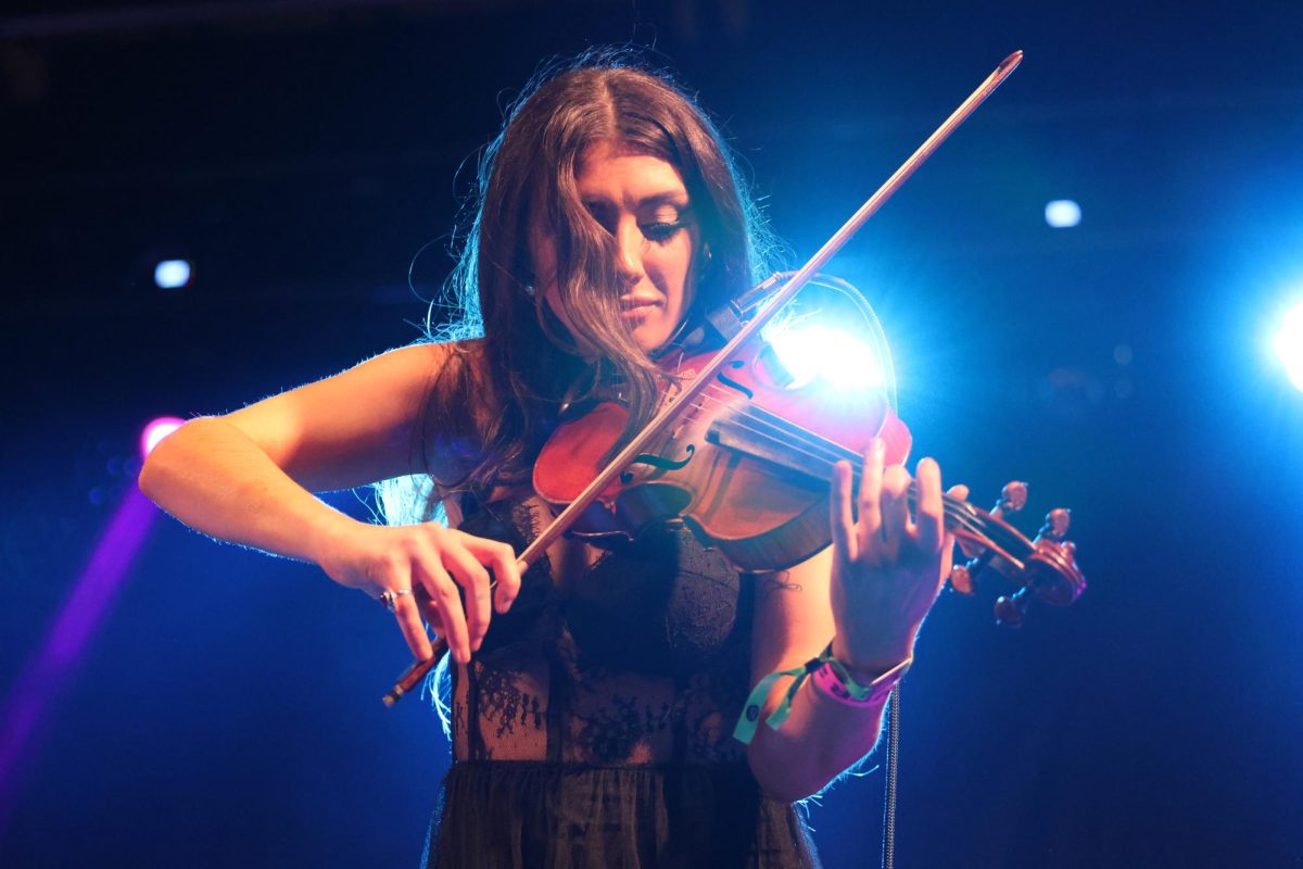 Geena preforming her violin solo during Parrotfishs set at the Gasparilla Music Festival.