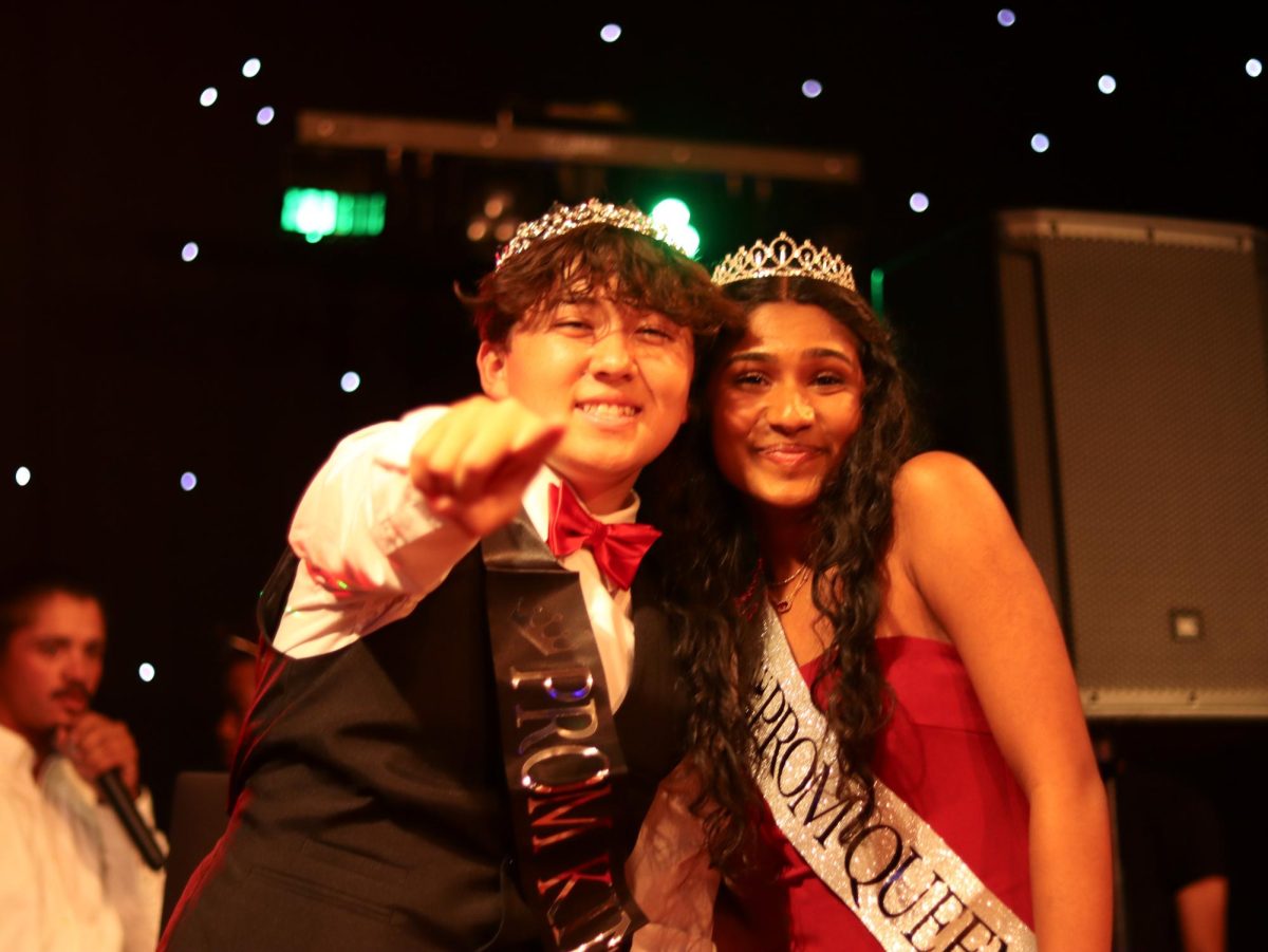 The prom King and Queen smile for the camera at Night of Knights 2024.
