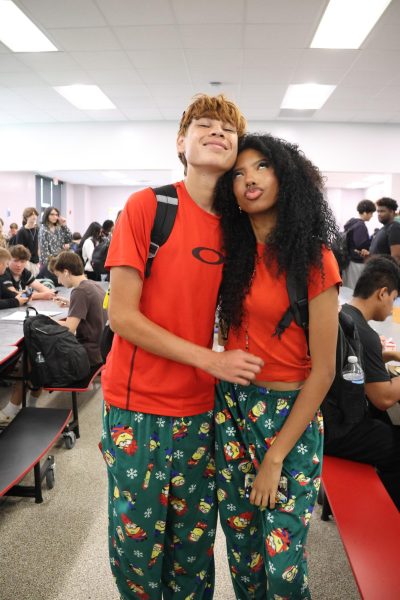 Seniors Rhiana DeJesus poses with her boyfriend in their matching pjs, dressing as the "Knight In" part of spirit day four. 