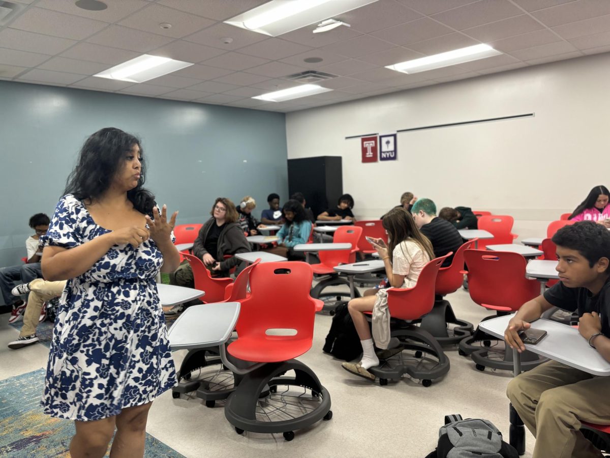 Dr. Bakht teaching her English 1 Honors class about vocabulary. 