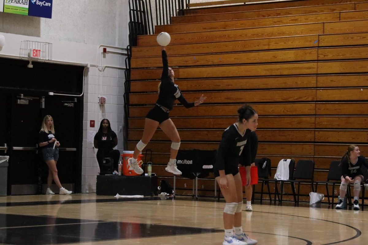 Emmery Capra ('27) moments before creating a streak of points just off of serving the ball.